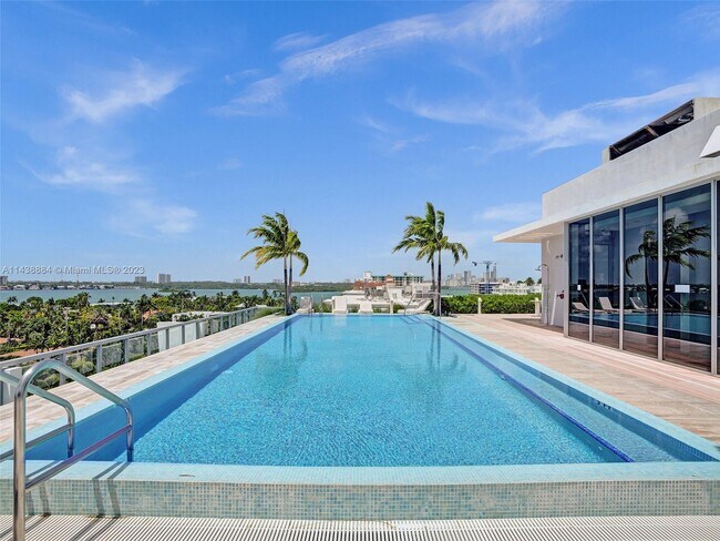 Building Photo - 9940 W Bay Harbor Dr