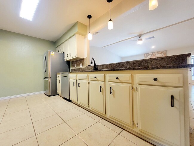 Building Photo - 3 Bed, 2 Bath Single-Level Gem with Firepl...
