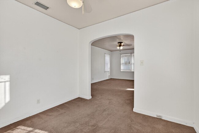 Building Photo - Spacious 3-Bedroom Corner Home with Garage & Private Courtyard