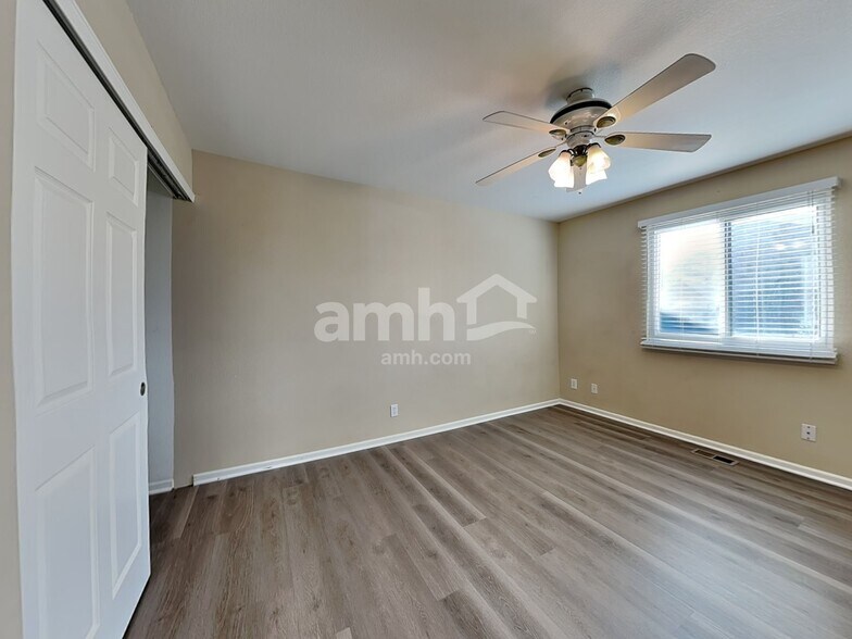 Building Photo - 3104 E 108th Dr