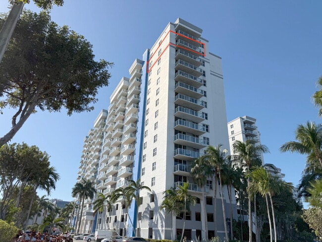 Building Photo - Rare 2/2 Corner Penthouse with Panoramic Lagoon Views from Every Room – Available Now!