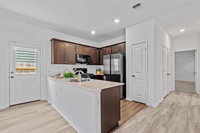 Building Photo - 7711 Poppy Petal Dr
