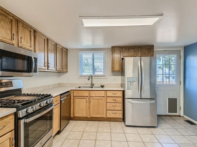 Building Photo - 1293 E 97th Ave