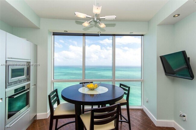 Building Photo - 18201 Collins Ave