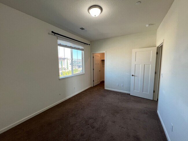 Building Photo - Beautiful 4 Bedroom Solar Home With Low Maintenance Landscaping And Updated Interior