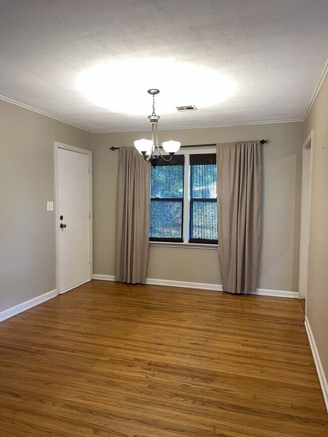 Building Photo - Located in the heart of Brookside, this inviting home sits on a spacious, fully fenced corner lot.