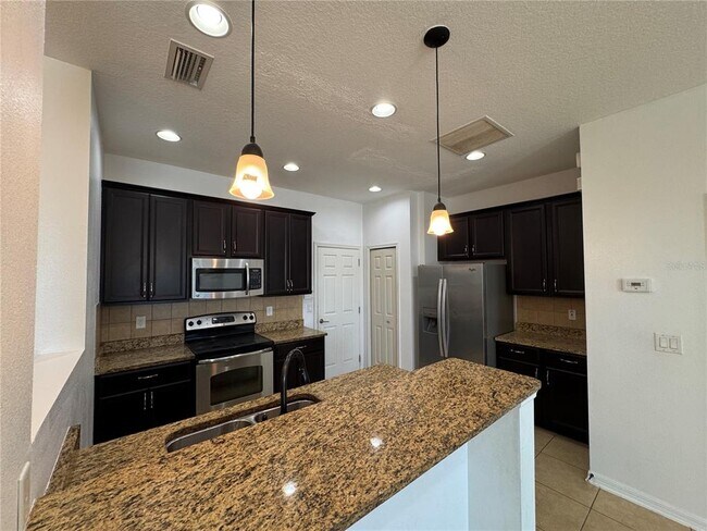 Building Photo - 11562 84th St Cir E