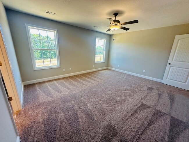 Building Photo - Beautiful Like-New 3 bed/2.5 bath w/ 2-car garage & fenced in backyard available June 24th!