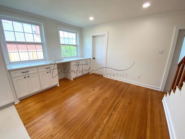 Building Photo - Spacious 4-Bedroom with Custom Finishes in...
