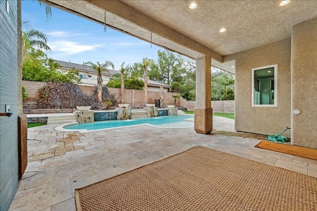 Building Photo - Fully Upgraded 5 Bedroom 4.5 Bathroom in Guard Gated Foothills Community!