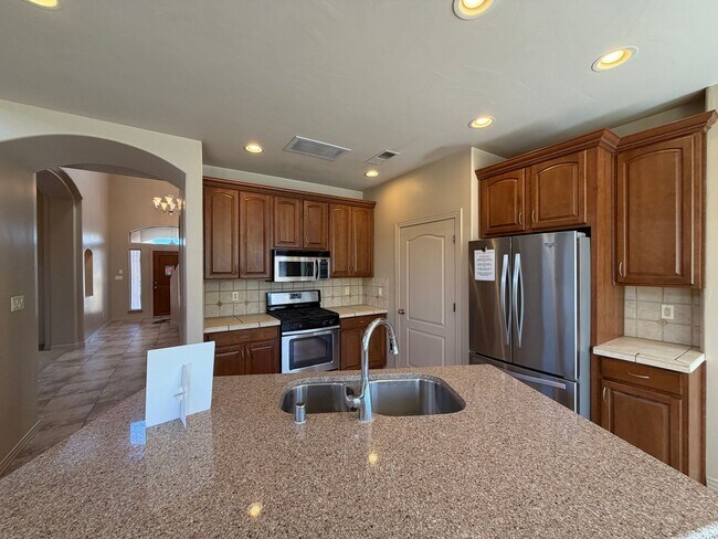 Building Photo - 4 Bedroom Home Plus Office Available Near Eubank Blvd NE & Paseo Del Norte!