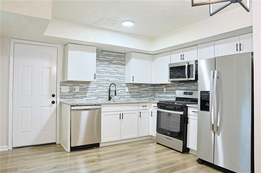 Building Photo - 4411 Flakes Mill Rd