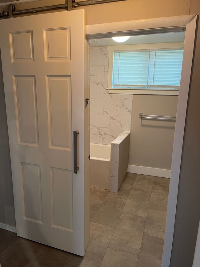 Building Photo - Roommate wanted to share charming cottage nestled in the woods!