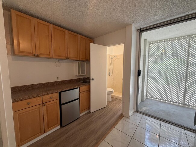 Building Photo - Upgraded studio available now in a secured building.