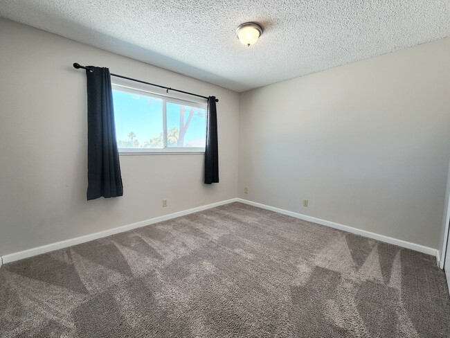 Building Photo - 4 Bedroom Two-Story Home with Downstairs Primary Bedroom & Fireplace