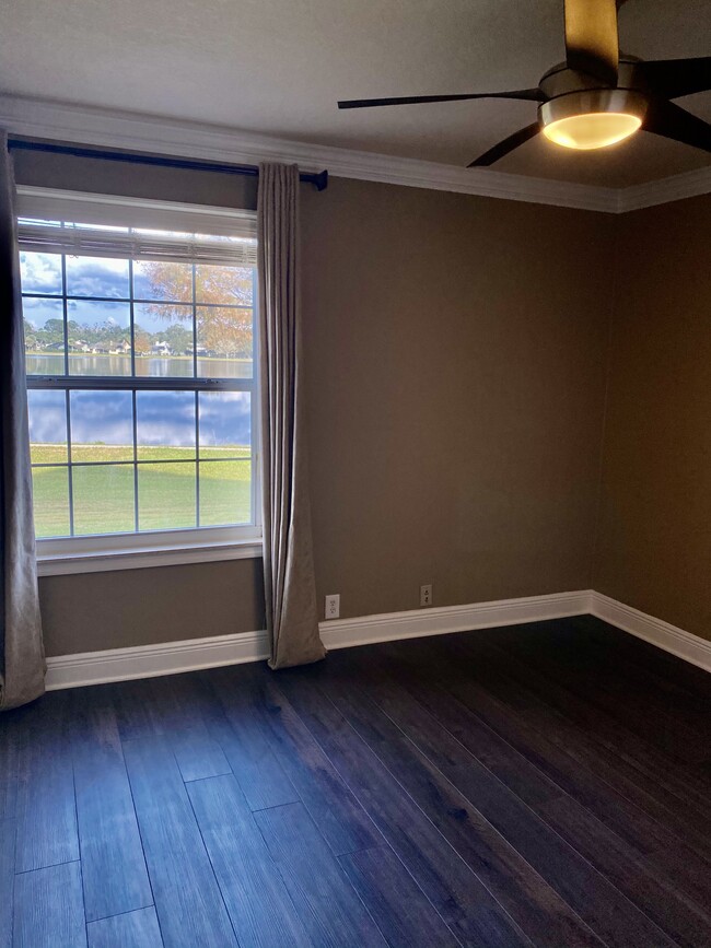 Bedroom #2 - new flooring, curtains and lake view - 556 Wekiva Cove Rd