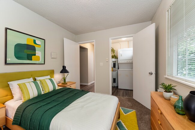 Step into your vibrant and functional bedroom haven. - University Crossing Apartments