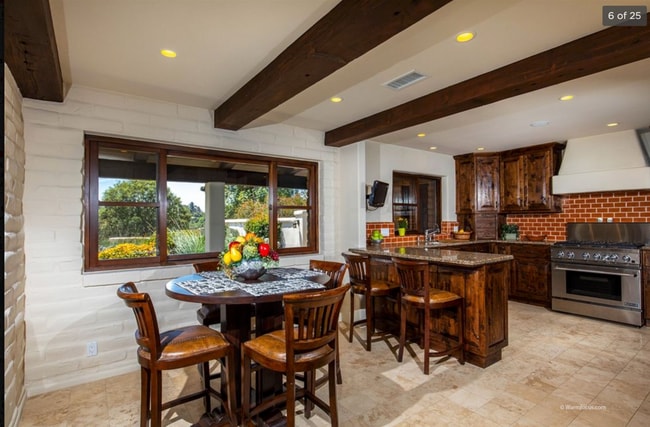 Building Photo - This Beautiful Hacienda Style Home combine...