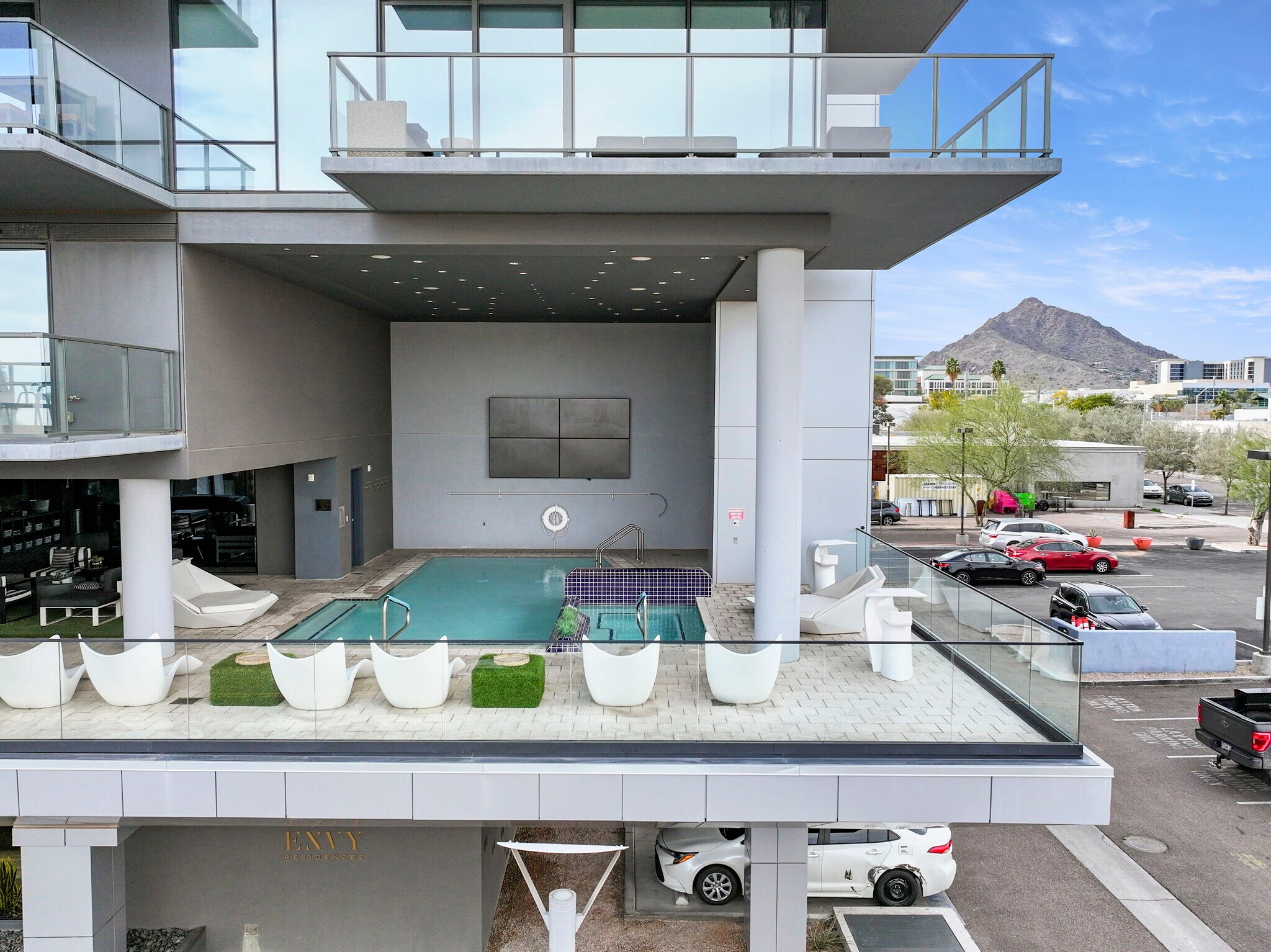 Envy's first class amenities start with a resort-style pool area on the second floor, open on two si - 4422 N 75th St