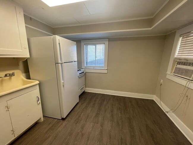 Building Photo - Simply the BEST! Adorable 1 Bedroom/1 Bath upstairs apartment home Located off Historic Camp Bowi...