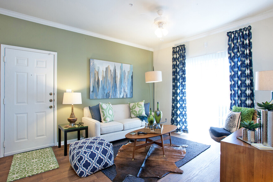 Living Room with large window - Indigo Pointe