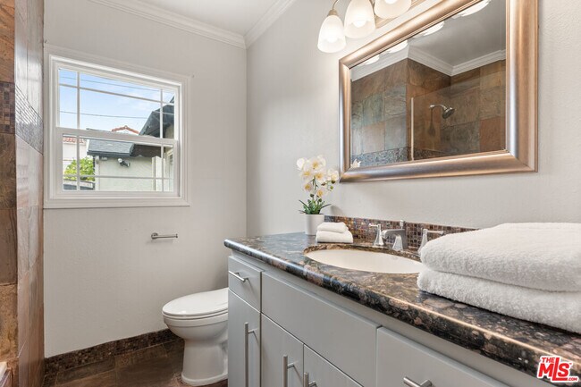 Building Photo - 419 S Almont Dr