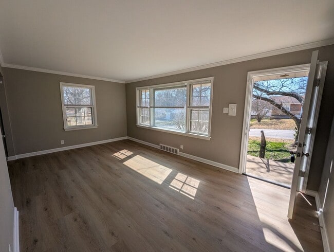 Building Photo - Fully Renovated Home with Sunroom, Garage & Huge Fenced Yard