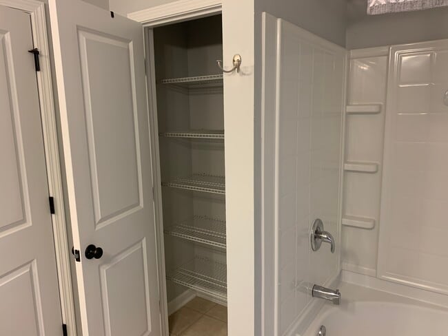 Master bath linen/storage closet - 1545 Oldenburg Dr