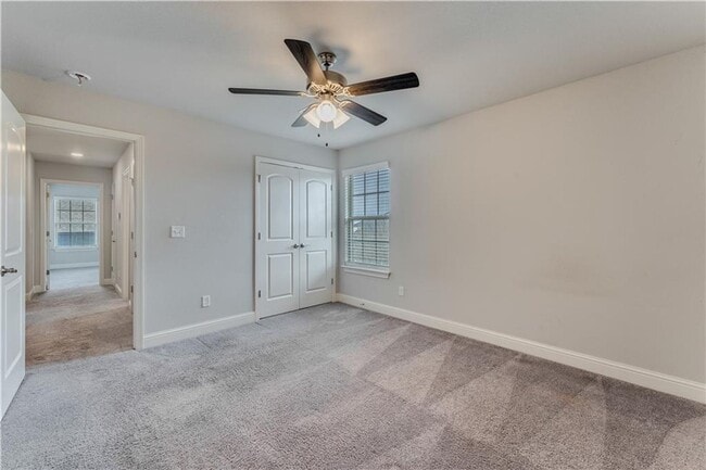 Building Photo - Minutes from I-49! 4BR/2.5BA Home