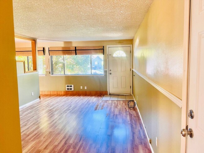 Building Photo - Charming 3BR/1BA w/ 1-car garage, long driveway, fenced yard, wood stove & shed/workshop.