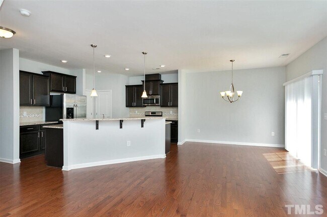 Building Photo - 3 Bedroom 2.5 Bathroom Townhome Home w/ Open Floorplan and a 2 car Garage in the heart of Morrisv...