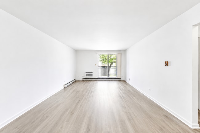 Building Photo - Spacious Rehabbed 1-Bedroom at The Vine | Private Balcony + Parking