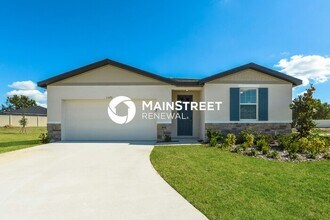 Building Photo - 4 Bedroom Pet-Friendly Home in Auburndale, FL with Main Street Renewal