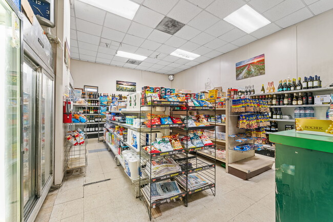 The Market sells food,pharmaceuticals, and alcohol - 4515 Willard Ave