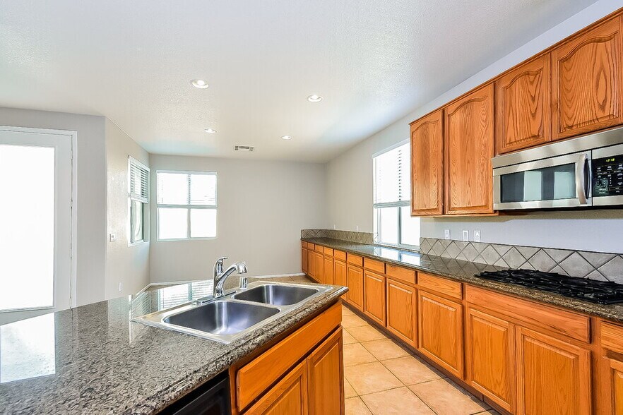 Building Photo - 9048 Blue Raven Ave