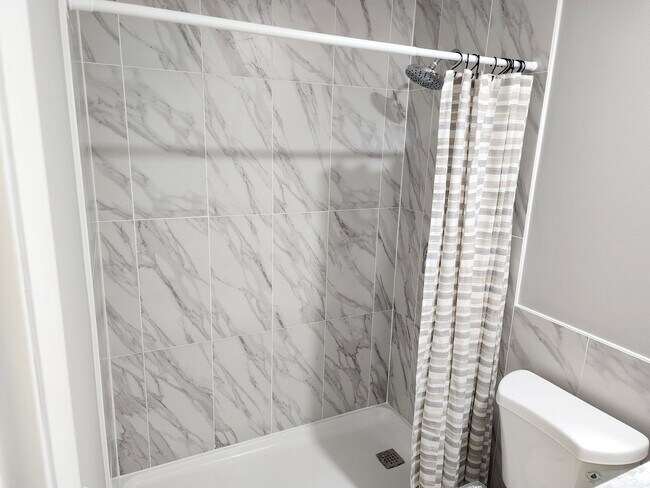 Building Photo - Magnificent 1 bedroom, 1.5 bathroom condo ...