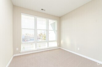 Building Photo - One Bedroom plus Den Luxury Apartment (Wal...