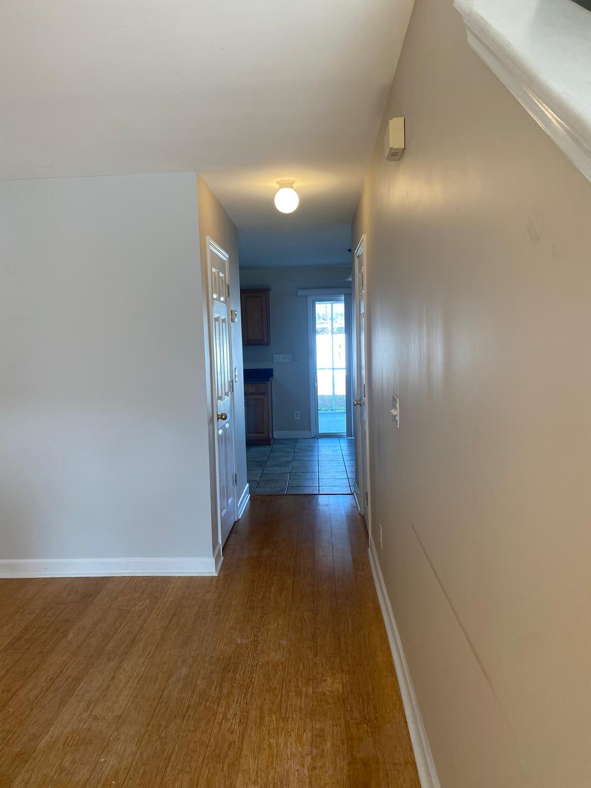 living room to kitchen - 765 Dragonfly Dr