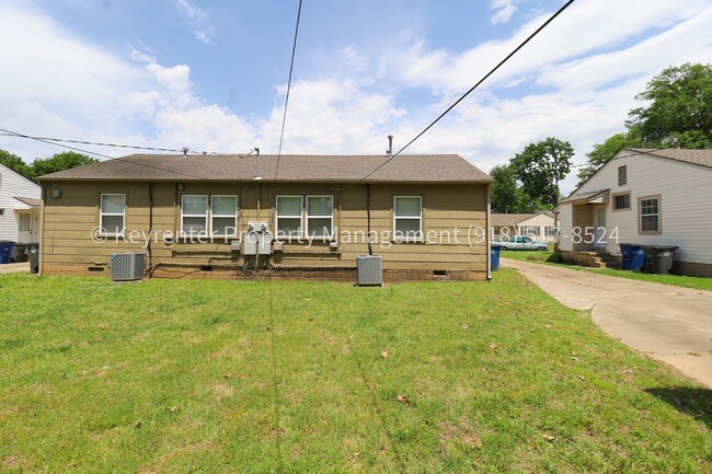 Building Photo - Gorgeous duplex unit on large lot with garage -- NO PETS ALLOWED