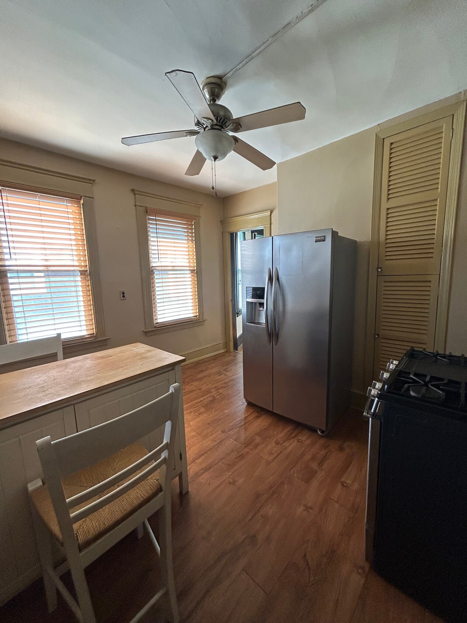 Kitchen island with table and refrigerator - 187 Alden Ave