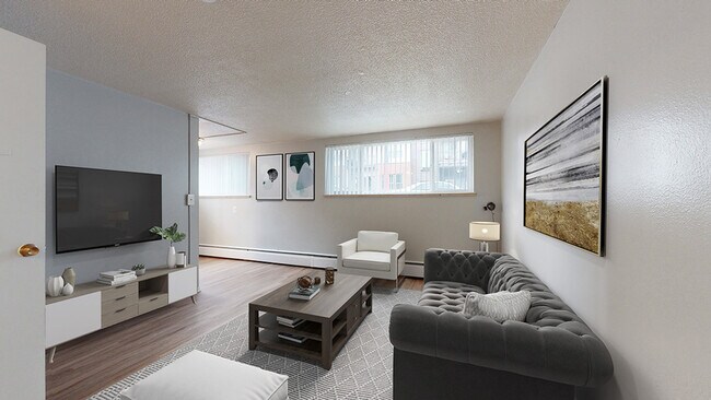 Experience elegance and comfort in this beautifully designed living room. - Harmony Apartments