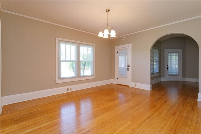 Building Photo - Run don't walk for this one of a kind beautifully maintained Old Florida Charmer on a park like d...