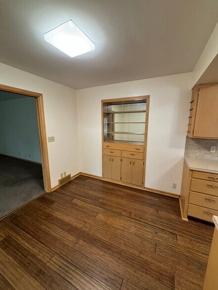 Dining with built in credenza storage - 815 E 6th St