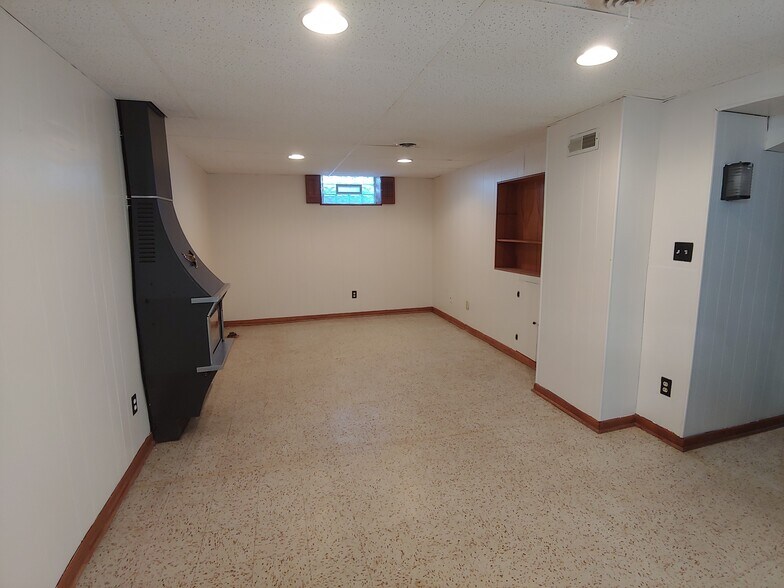 Finished half of basement, from behind bar. - 7415 1st Ave S