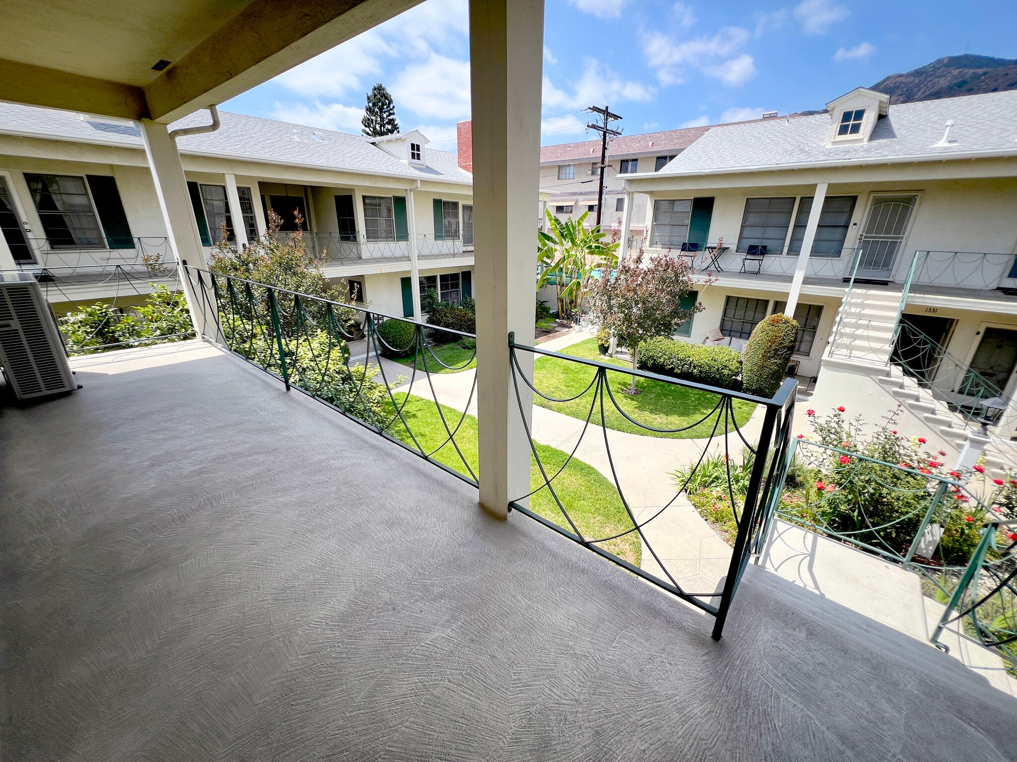Front balcony with courtyard views. - 1327 N Central Ave