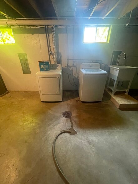 Washer, Dryer and Sink in basement - 1537 Boones Lick Rd