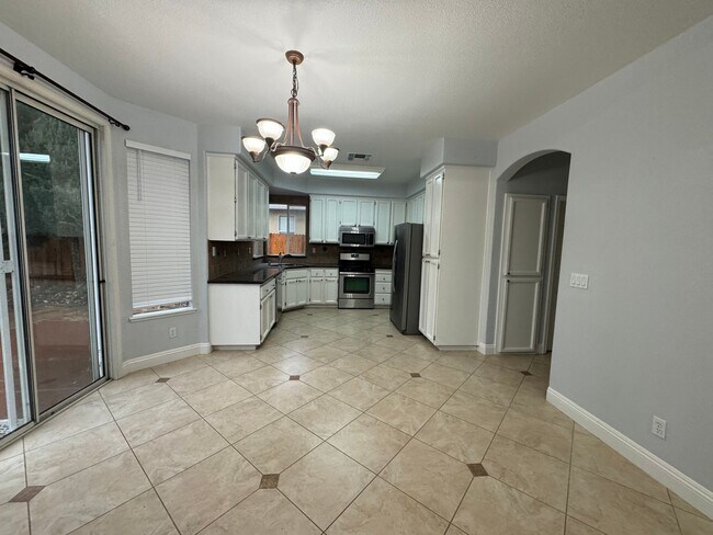 Building Photo - BEAUTIFUL TWO STORY 4 BED, 3 FULL BATH, & 2 CAR GARAGE