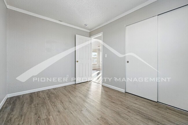 Building Photo - Spacious 3-Bedroom Home with Modern Features and Private Yard