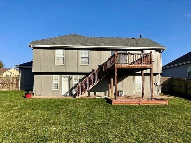 Building Photo - Spacious 4-Bedroom Greenwood Home with Vau...