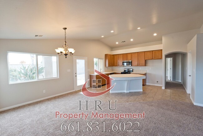 Building Photo - SW-Bakersfield  features 4 bed 2 bath with...